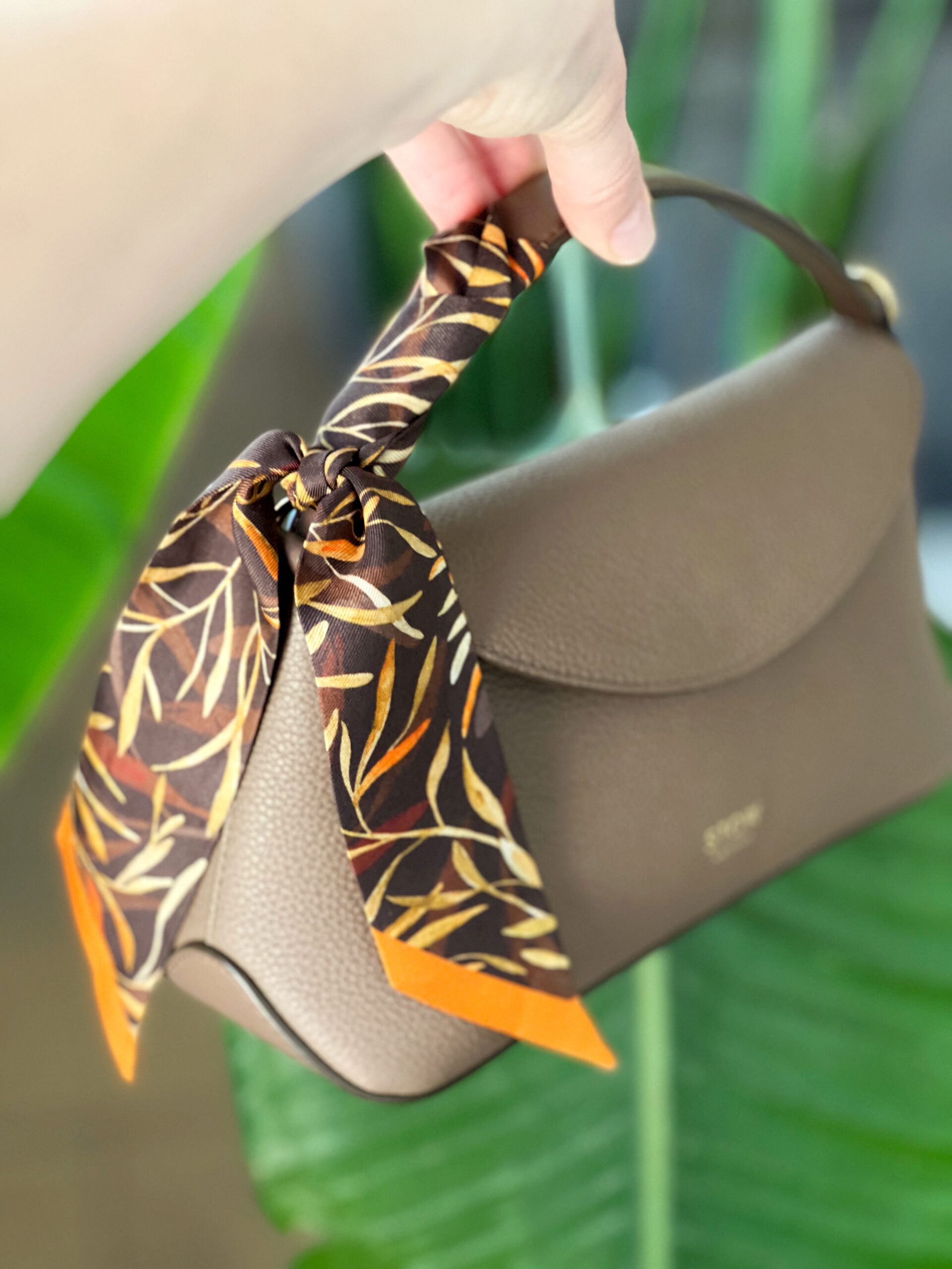 Kensa silk bracelet as a handbag charm Kensa silk bracelet as a handbag charm